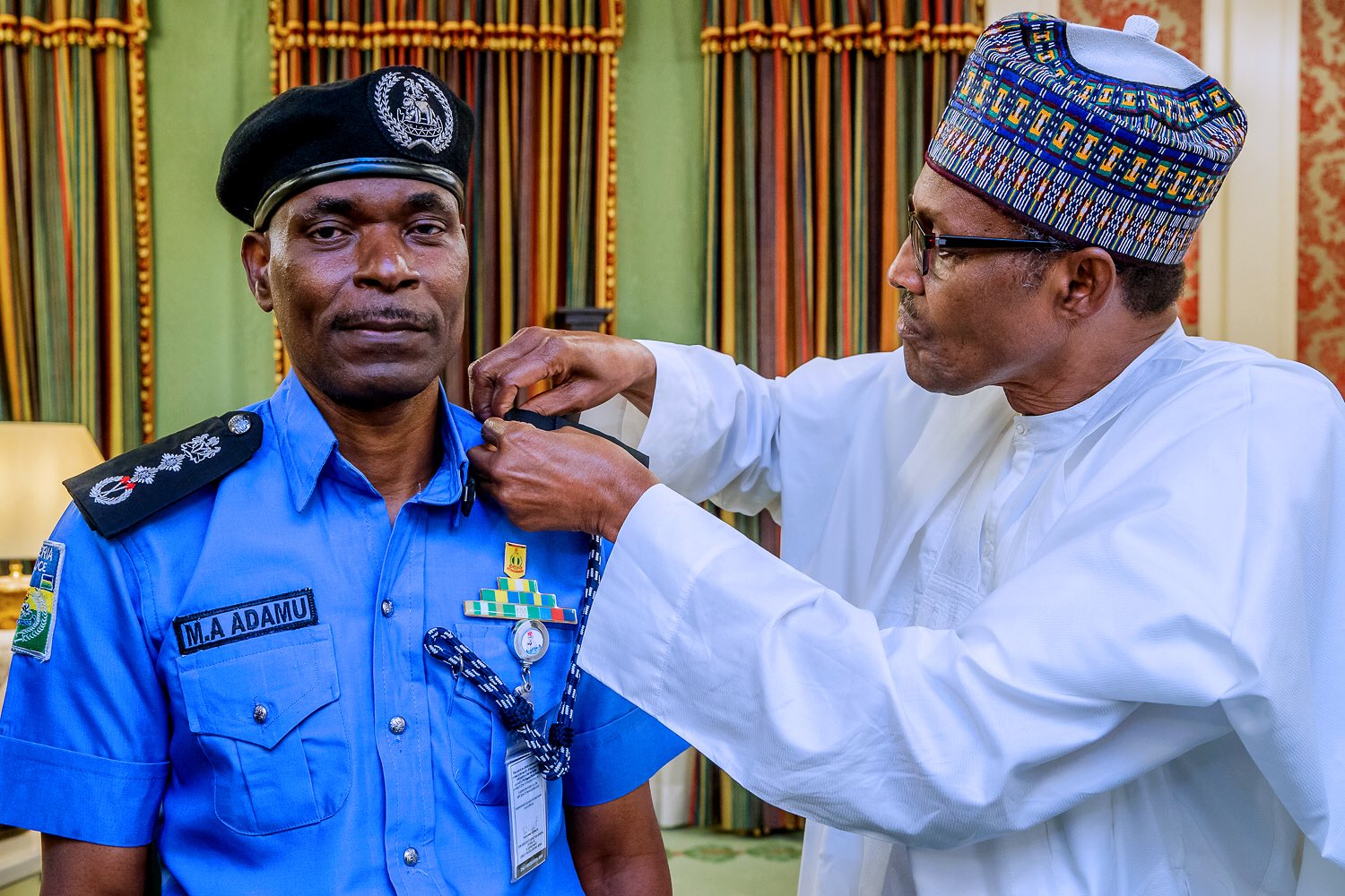 Buhari decorates new IGP Mohammad Abubakar Adamu